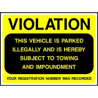 Picture of "Violation- This Vehicle Is Parked Illegally And Is Herby Subject To Towing And Impoundment" Sign 