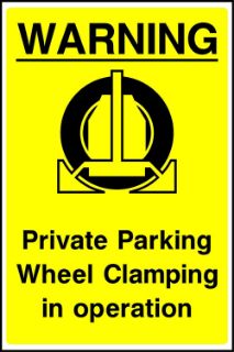 Picture of Warning Private parking wheel clamping in operation 